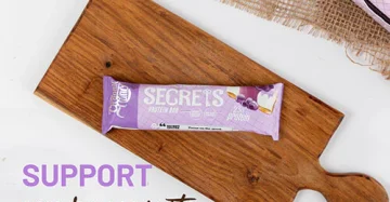 Secrets Protein Bar Blueberry Cheesecake-سناك بروتين سيكرتس بنكهة التشيز كيك بالتوت الأزرق